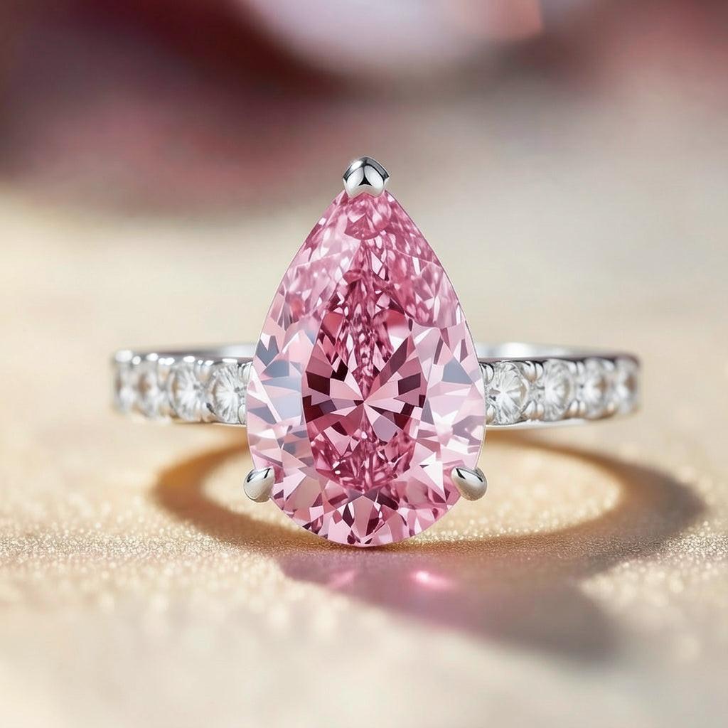 Aurora‘s Grace | 3CT Pear Cut Pink Solitaire Ring.