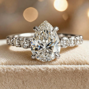 Aurora‘s Whisper | 2CT Pear Cut Moissanite Eternity Ring.