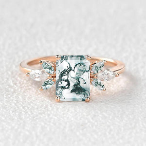 Aethra’s Pinions | Emerald Cut Moss Agate Cluster Wing Engagement Ring.