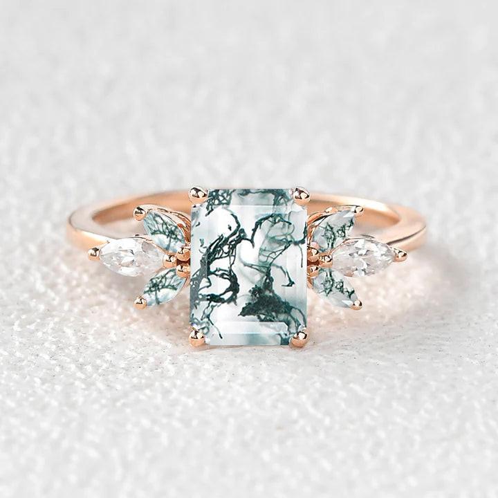 Aethra’s Pinions | Emerald Cut Moss Agate Cluster Wing Engagement Ring.