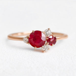 Rosalind’s Rose | Round Ruby Engagement Ring with Drifting Diamond Petal Halo