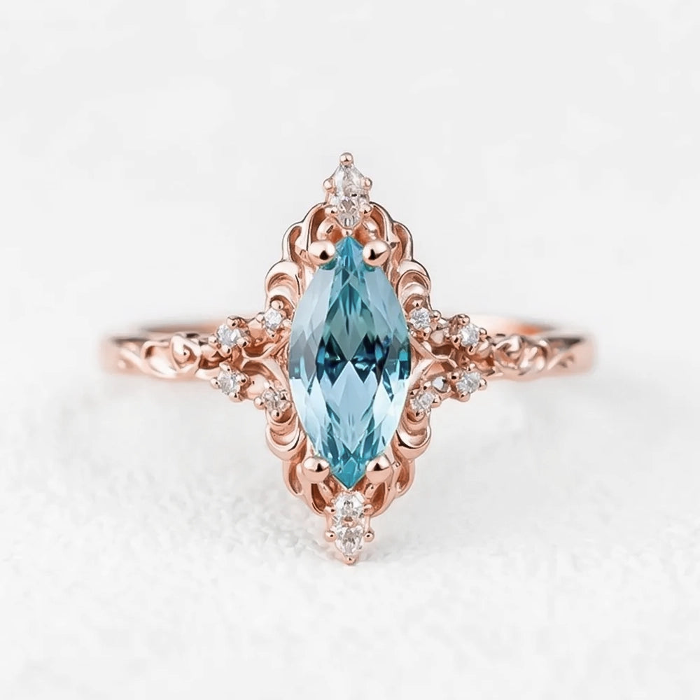 Aurora’s Swirl | Vintage Marquise Aquamarine Filigree Engagement Ring.