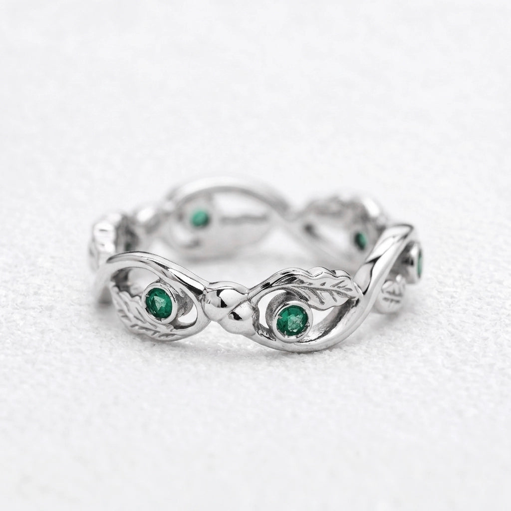 The Lacy Oak | Openwork Oak Leaves & Natural Emerald Women's Wedding Band.
