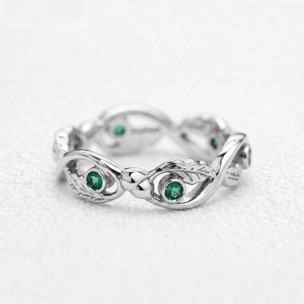 The Lacy Oak | Openwork Oak Leaves & Natural Emerald Women's Wedding Band.
