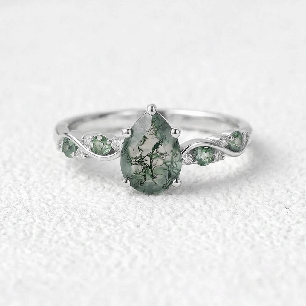 Flora’s Sprig | Pear Cut Moss Agate Engagement Ring.