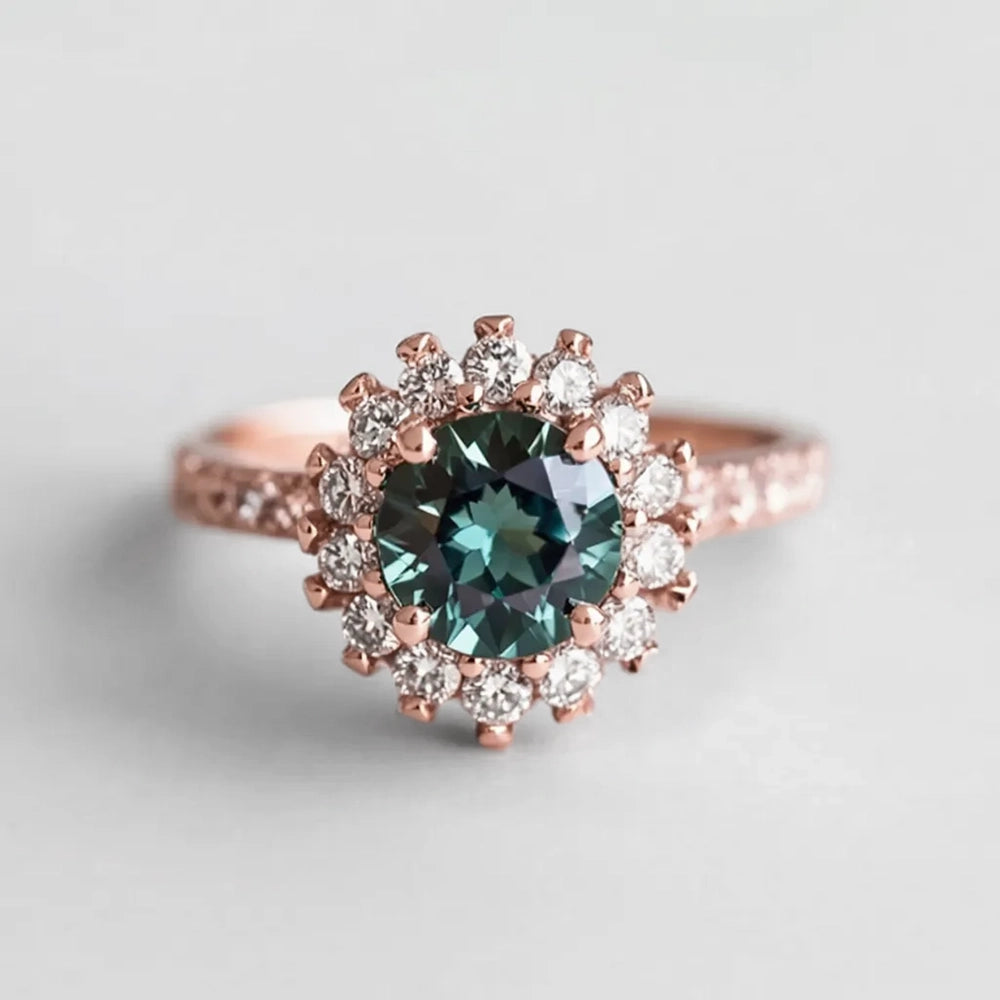 Stella’s Twilight | Blue Sapphire Halo Engagement Ring.