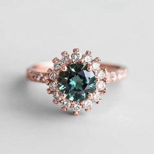 Stella’s Twilight | Blue Sapphire Halo Engagement Ring.