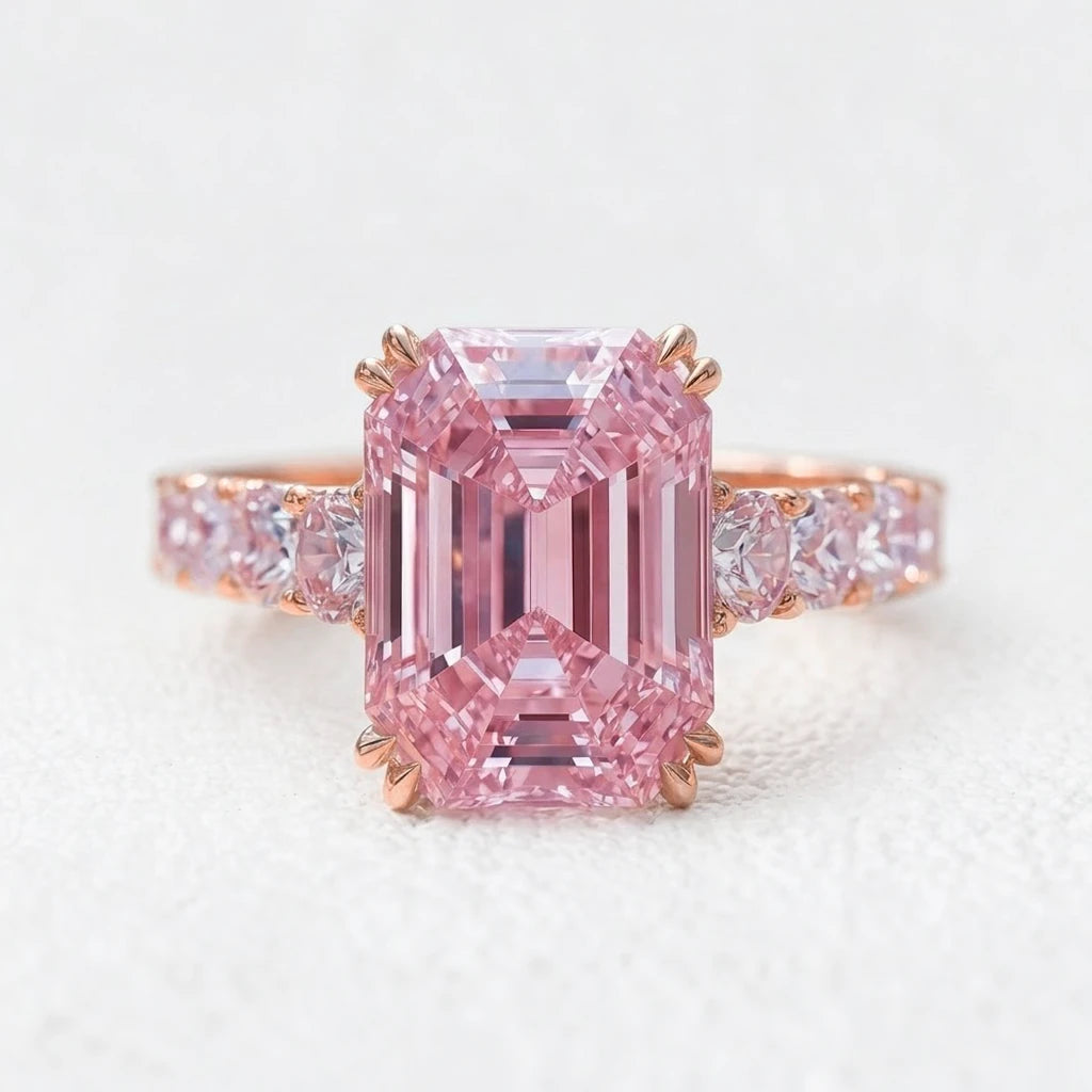 Aurora’s Aureole | 3CT Emerald Cut Pink Sapphire Engagement Ring