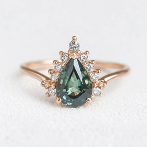Mermaid’s Crown | Pear Teal Sapphire Halo Engagement Ring.