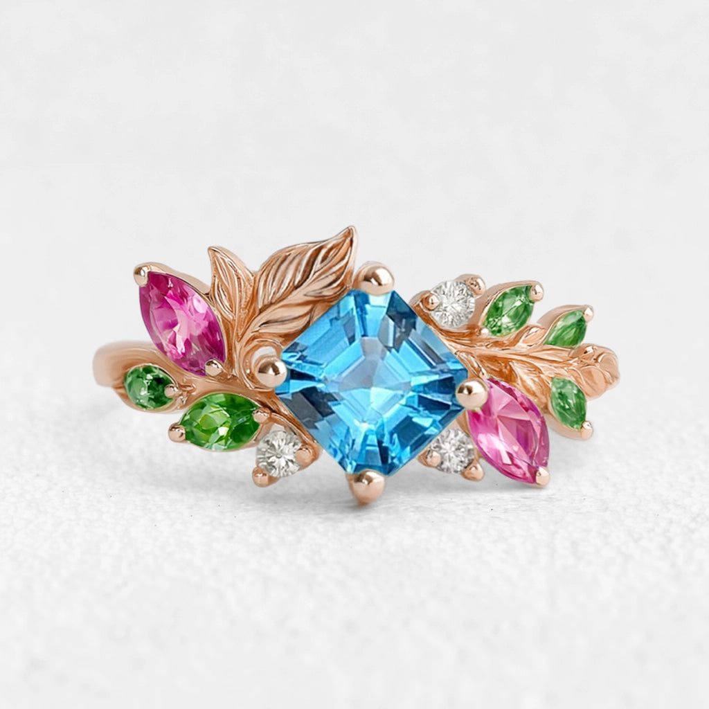 Aurora’s Leafwhisper | Swiss Blue Asscher Cut Topaz Nature Inspired Leafy Engagement Ring.