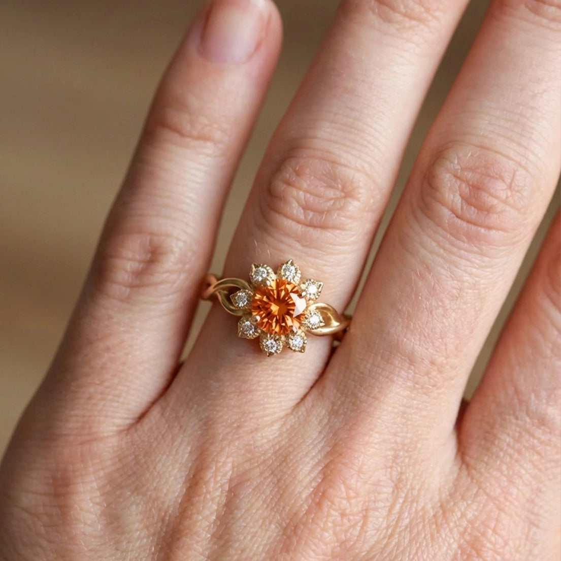 Ivy’s Corolla | Round Orange Garnet Engagement Ring with Petal Halo.