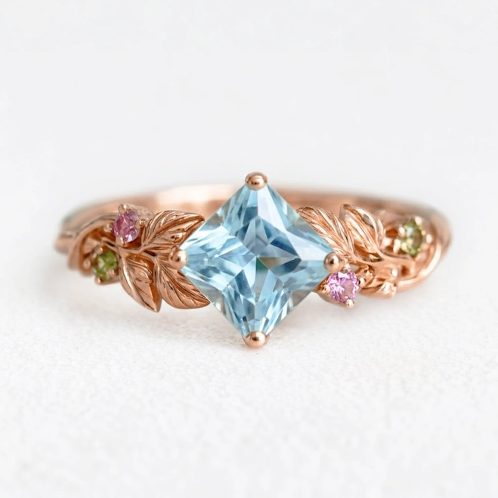 Cressida’s Stillness | Clear Blue Aquamarine Leafy Engagement Ring.