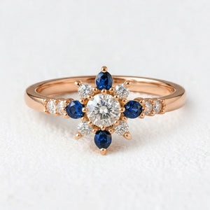 Sylvia’s Bloom | Round Diamond & Sapphire Petal Engagement Ring