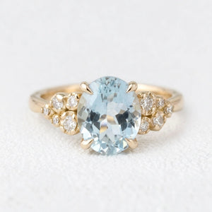 Marina’s Bloom | Oval Aquamarine Diamond Floral Cluster Ring.