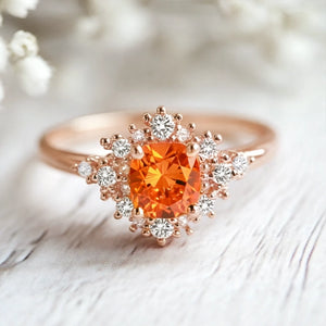 Vivienne’s Amber | Round Cut Orange Sapphire Halo Engagement Ring.