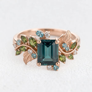 Ivy’s Embrace | Emerald Cut Blue Green Tourmaline Vine & Leaf Engagement Ring.