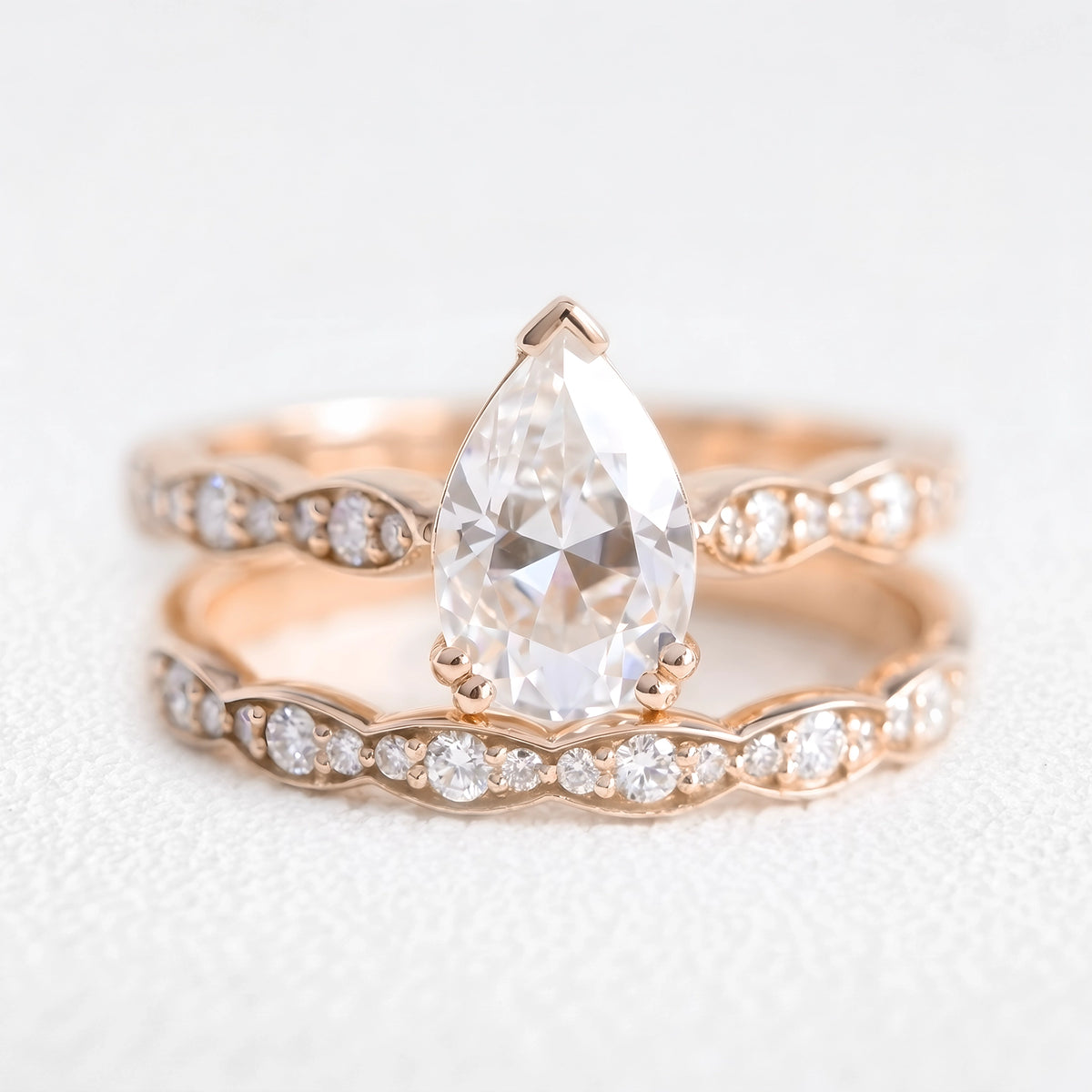 Genevieve’s Harmony | 1.5CT Pear Cut Diamond with Scalloped Pavé Bridal Duo