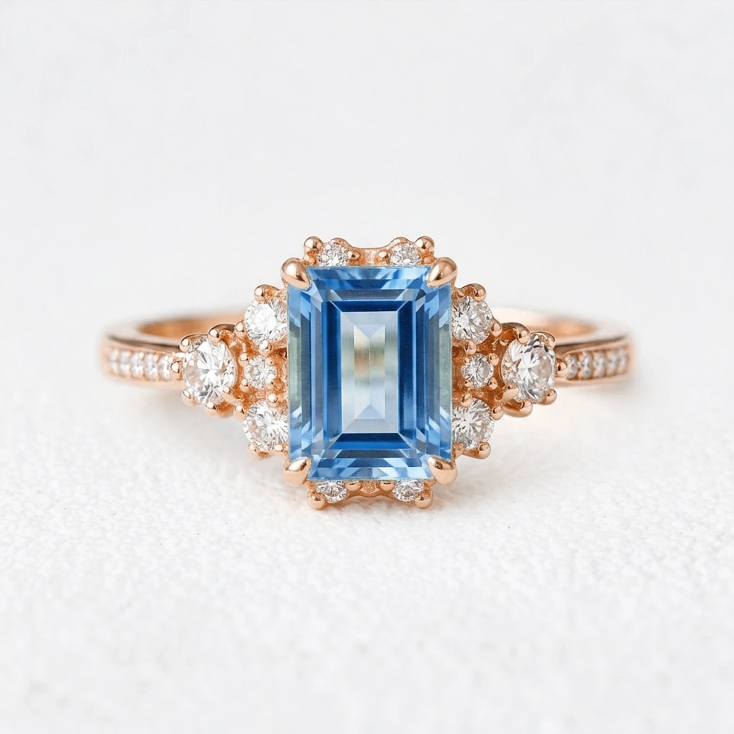Rosalind‘s Coronet | Emerald Cut Sapphire Halo Engagement Ring