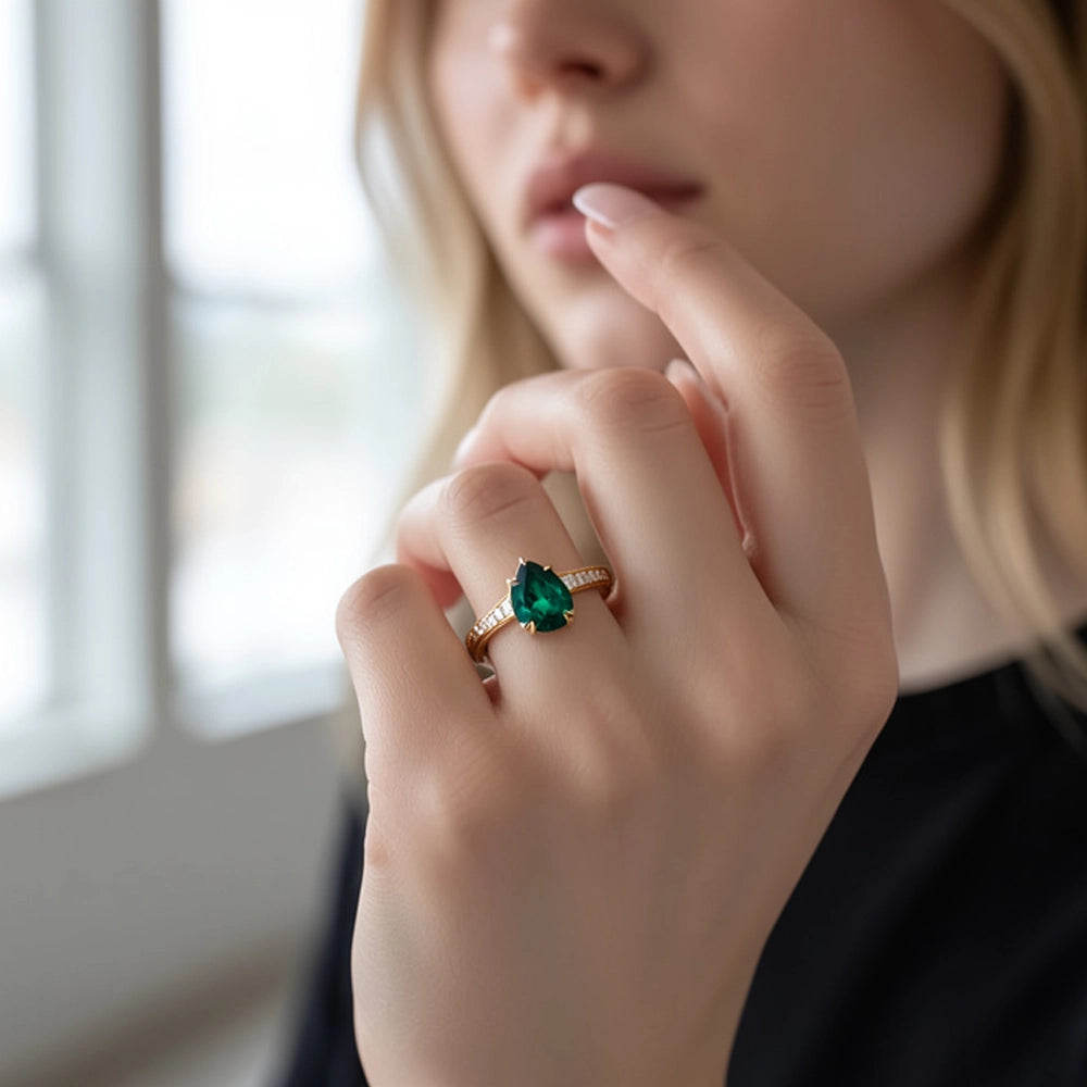 Olive’s Whisper | 1.5CT Classic Pear Cut Lab Emerald Engagement Ring.