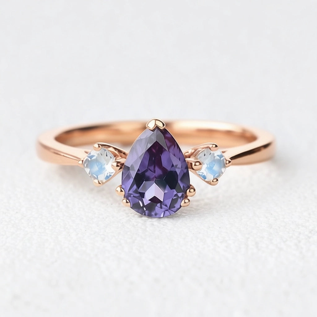 Selene’s Mirage | Pear Tanzanite & Moonstone Engagement Ring