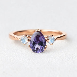 Selene’s Mirage | Pear Tanzanite & Moonstone Engagement Ring