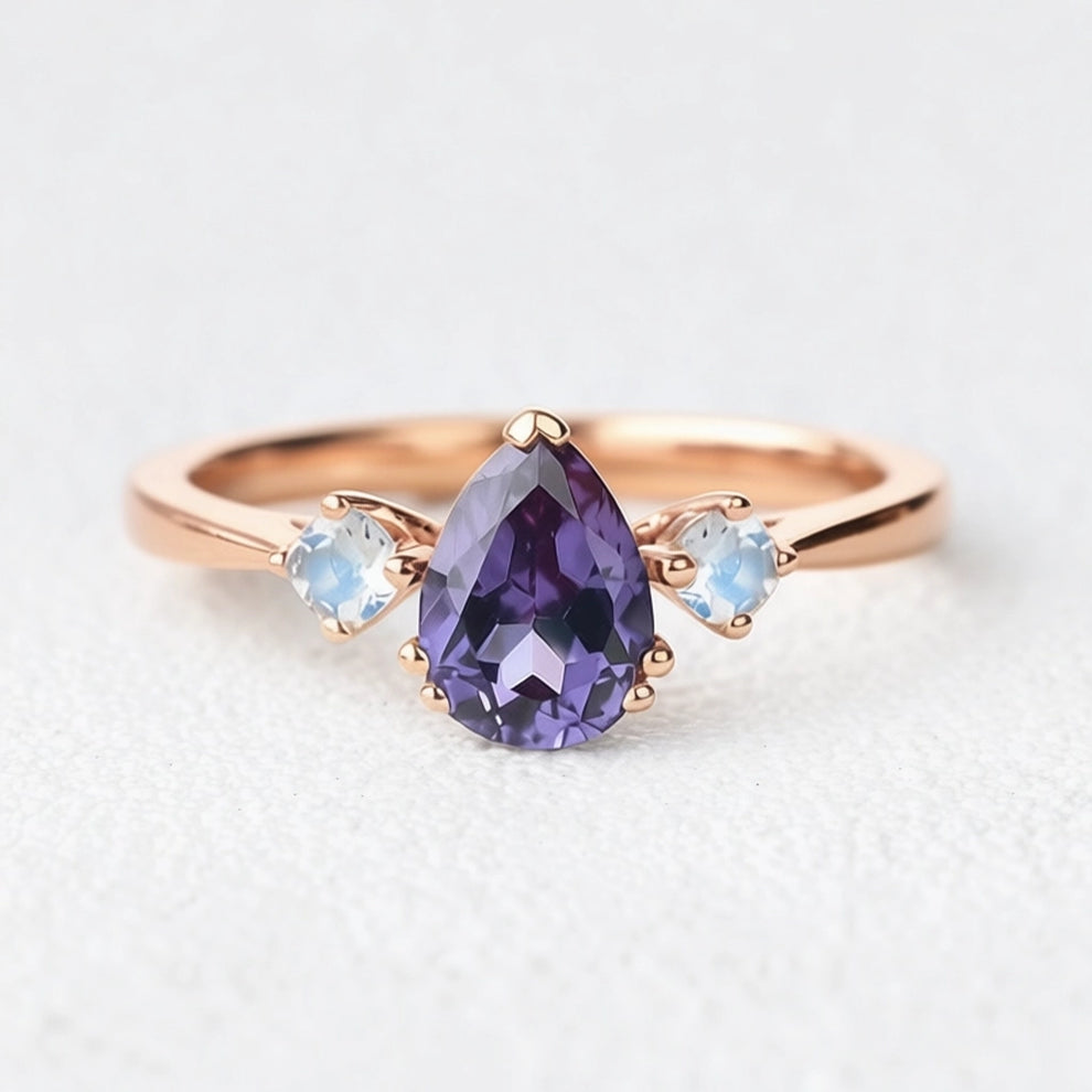 Selene’s Mirage | Pear Tanzanite & Moonstone Engagement Ring