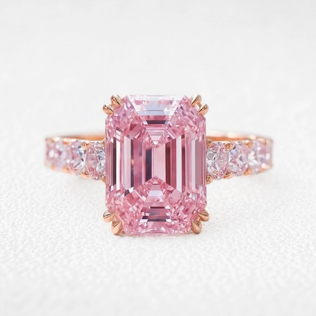 Aurora’s Aureole | 3CT Emerald Cut Pink Sapphire Engagement Ring