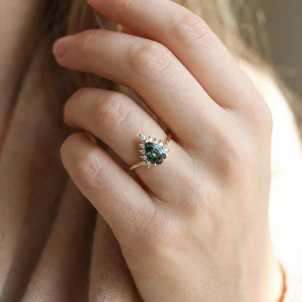 Mermaid’s Crown | Pear Teal Sapphire Halo Engagement Ring.