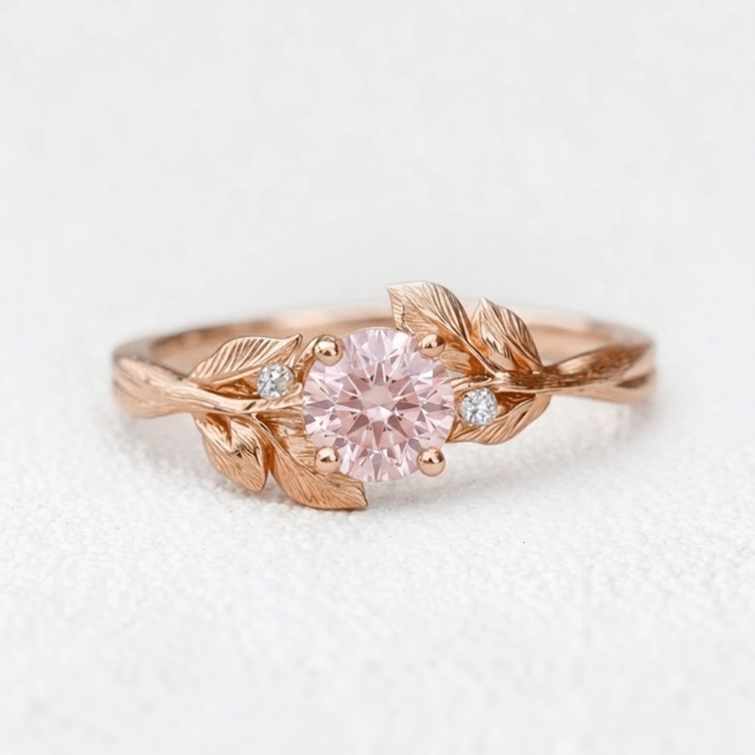 Daphne’s Dawn | Round Cut Pink Sapphire Engagement Ring