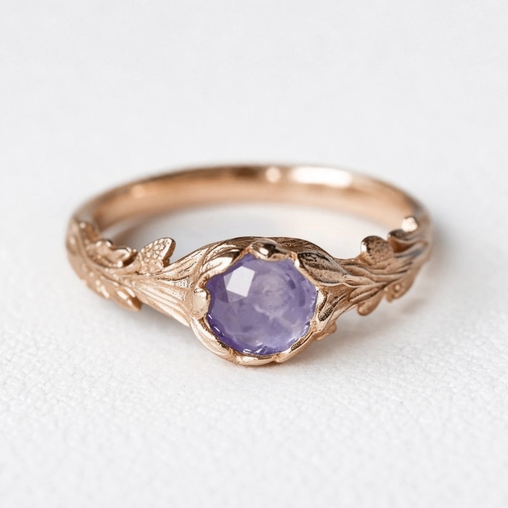Daphne’s Branch | Round Tanzanite Engagement Ring with Sculptural Vine Band.