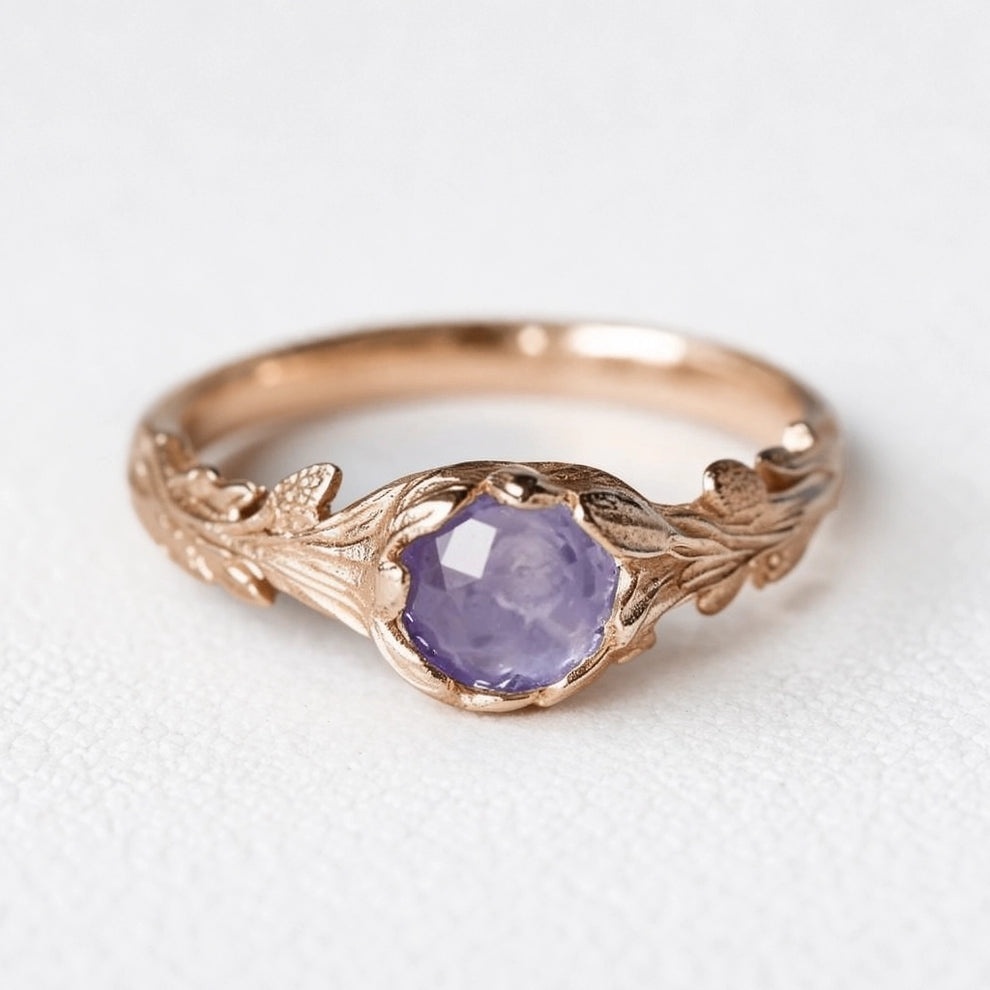 Daphne’s Branch | Round Tanzanite Engagement Ring with Sculptural Vine Band.