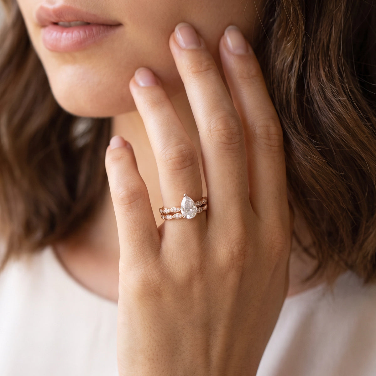 Genevieve’s Harmony | 1.5CT Pear Cut Diamond with Scalloped Pavé Bridal Duo