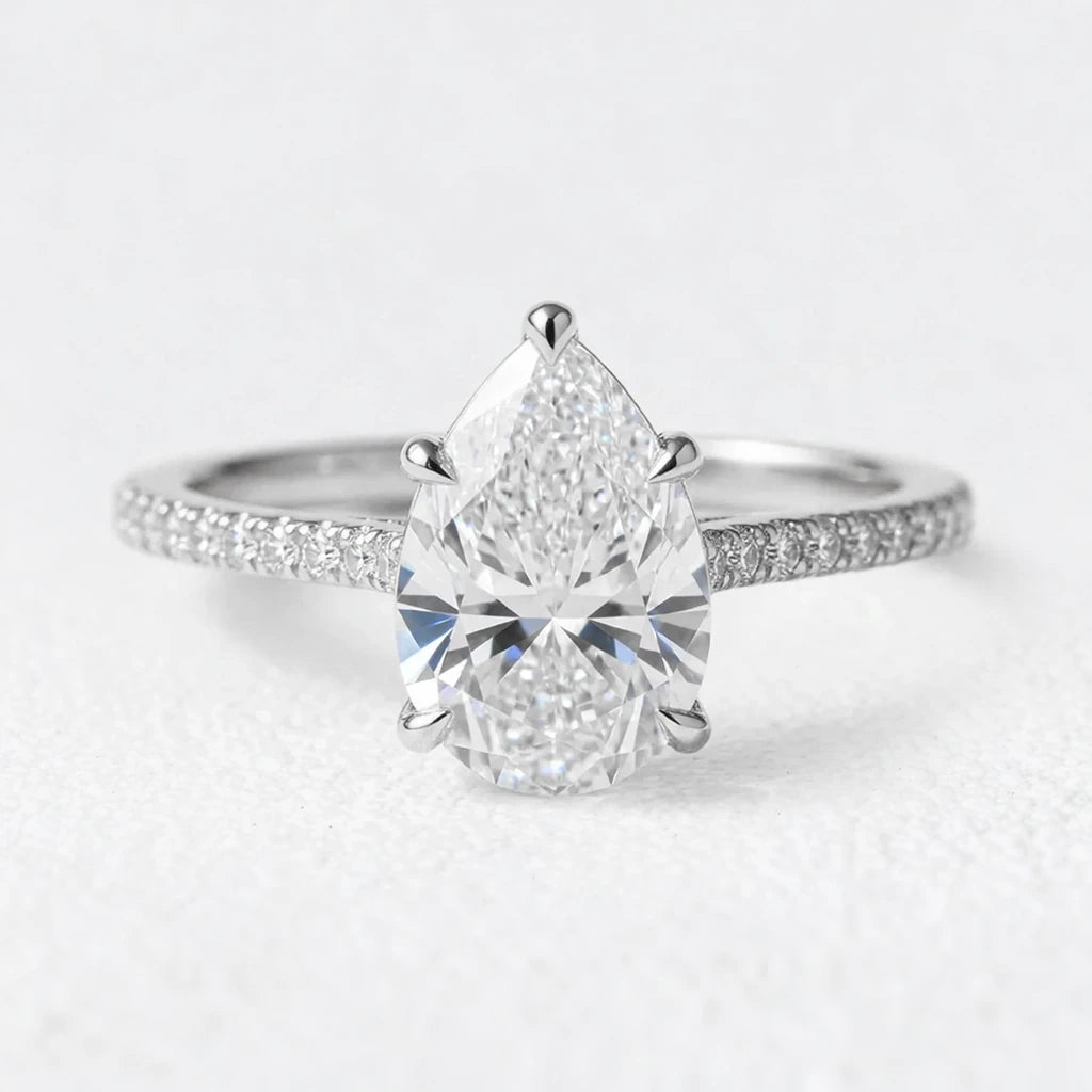 Aurelia's Radiance | 1.5CT Pear Diamond Pavé Solitaire Engagement Ring