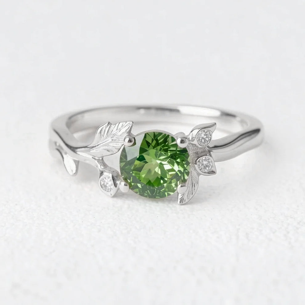 Lumière’s Verde | Round Cut Peridot Vine Engagement Ring