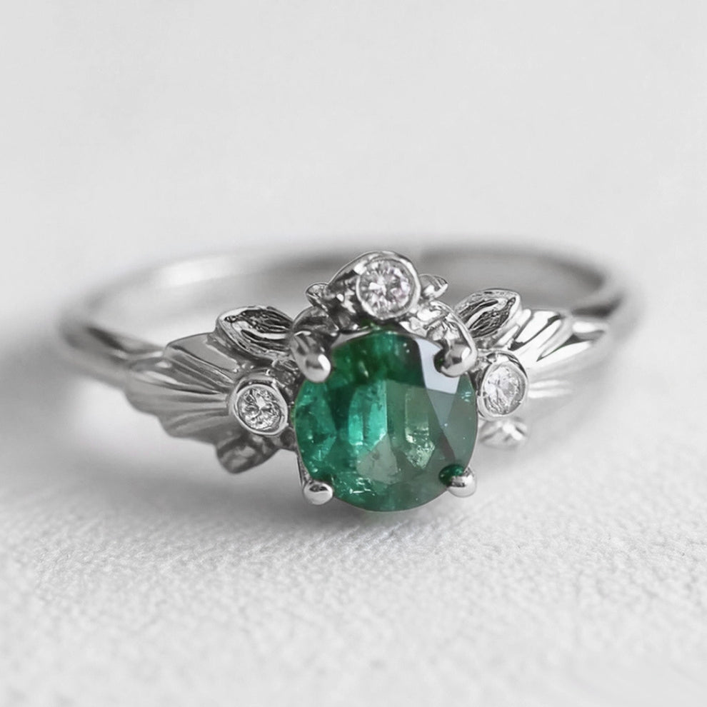 Eve’s Laurel | Natural Emerald Engagement Ring with Diamond Leaf Setting.