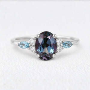 Theodora’s Rhapsody | Oval Alexandrite & Topaz Engagement Ring