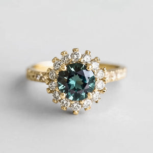 Stella’s Twilight | Blue Sapphire Halo Engagement Ring.