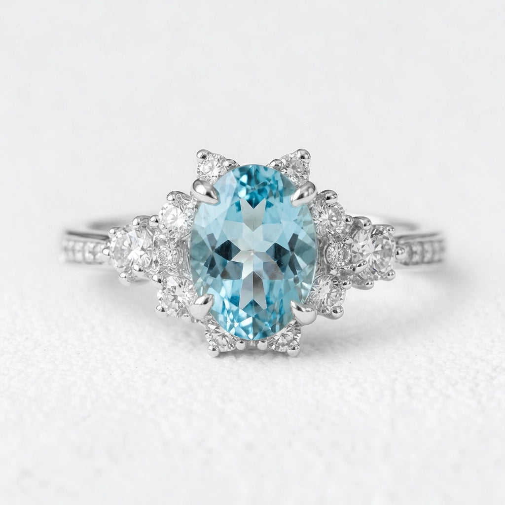 Aria‘s Bay | Oval Cut Blue Topaz Halo Engagement Ring.