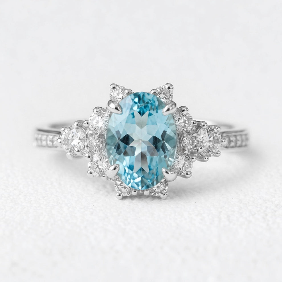 Aria‘s Bay | Oval Cut Blue Topaz Halo Engagement Ring.
