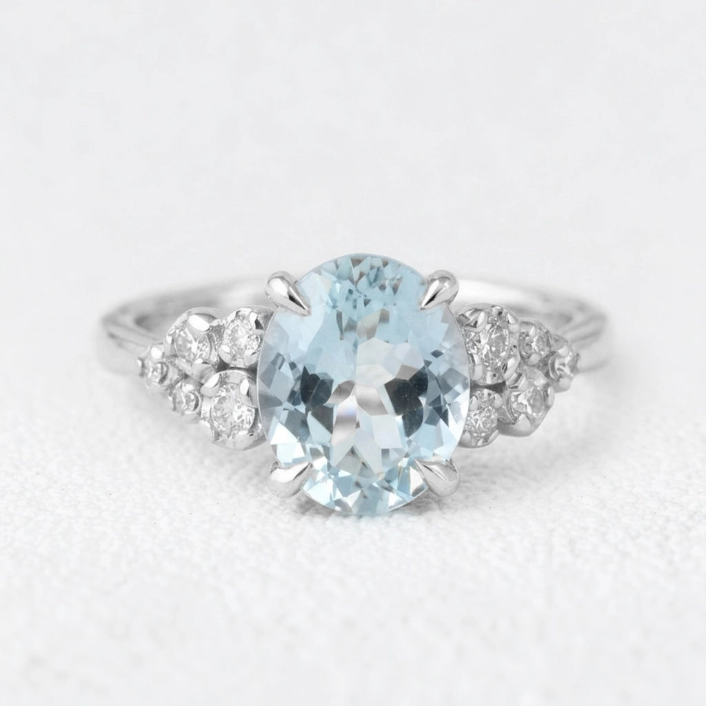 Marina’s Bloom | Oval Aquamarine Diamond Floral Cluster Ring.