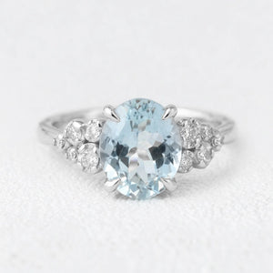 Marina’s Bloom | Oval Aquamarine Diamond Floral Cluster Ring.