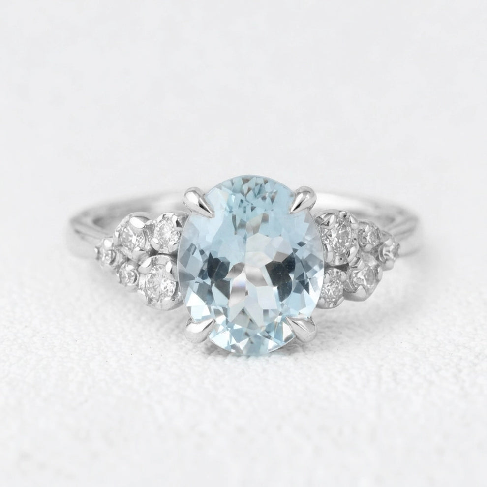 Marina’s Bloom | Oval Aquamarine Diamond Floral Cluster Ring.