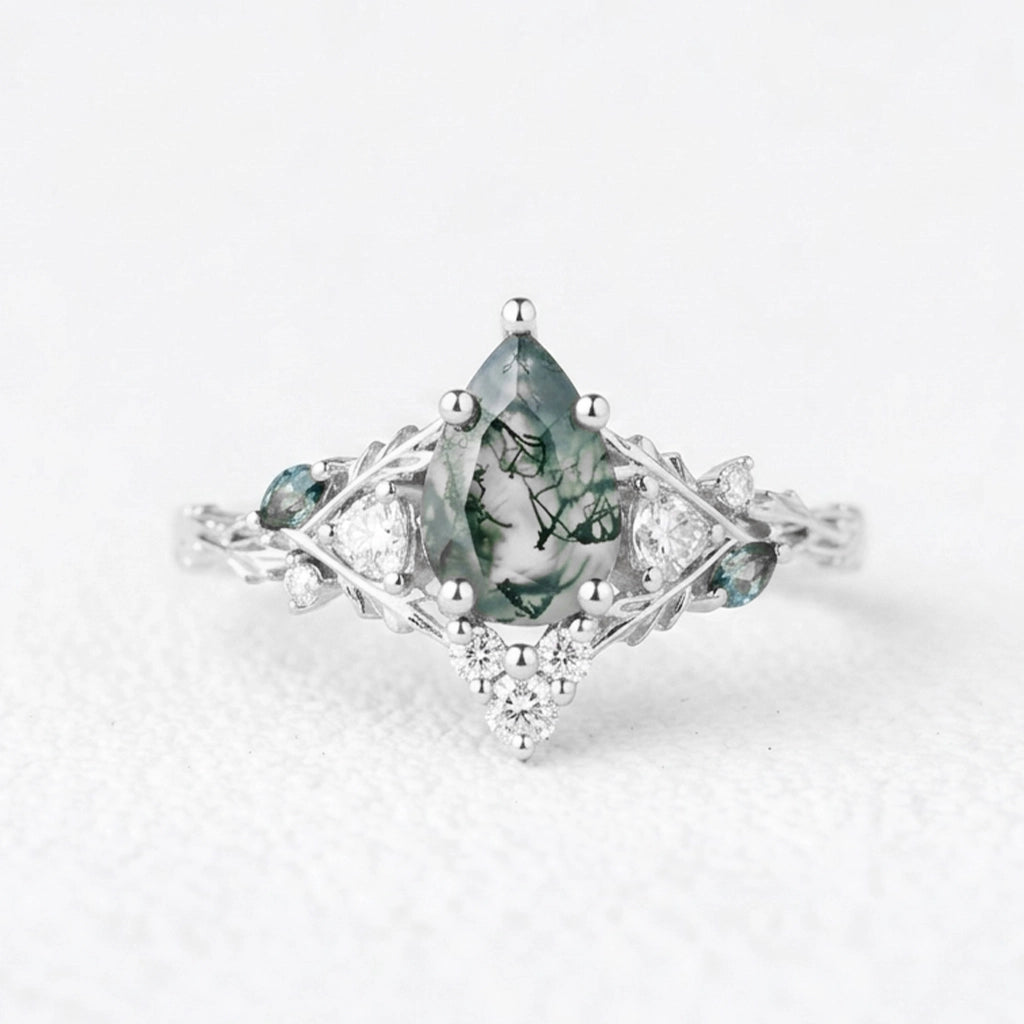 Katriel Pear Cut Lab Moss Agate Oak Leaf Engagement Ring.
