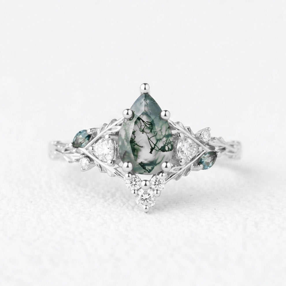 Katriel Pear Cut Lab Moss Agate Oak Leaf Engagement Ring.