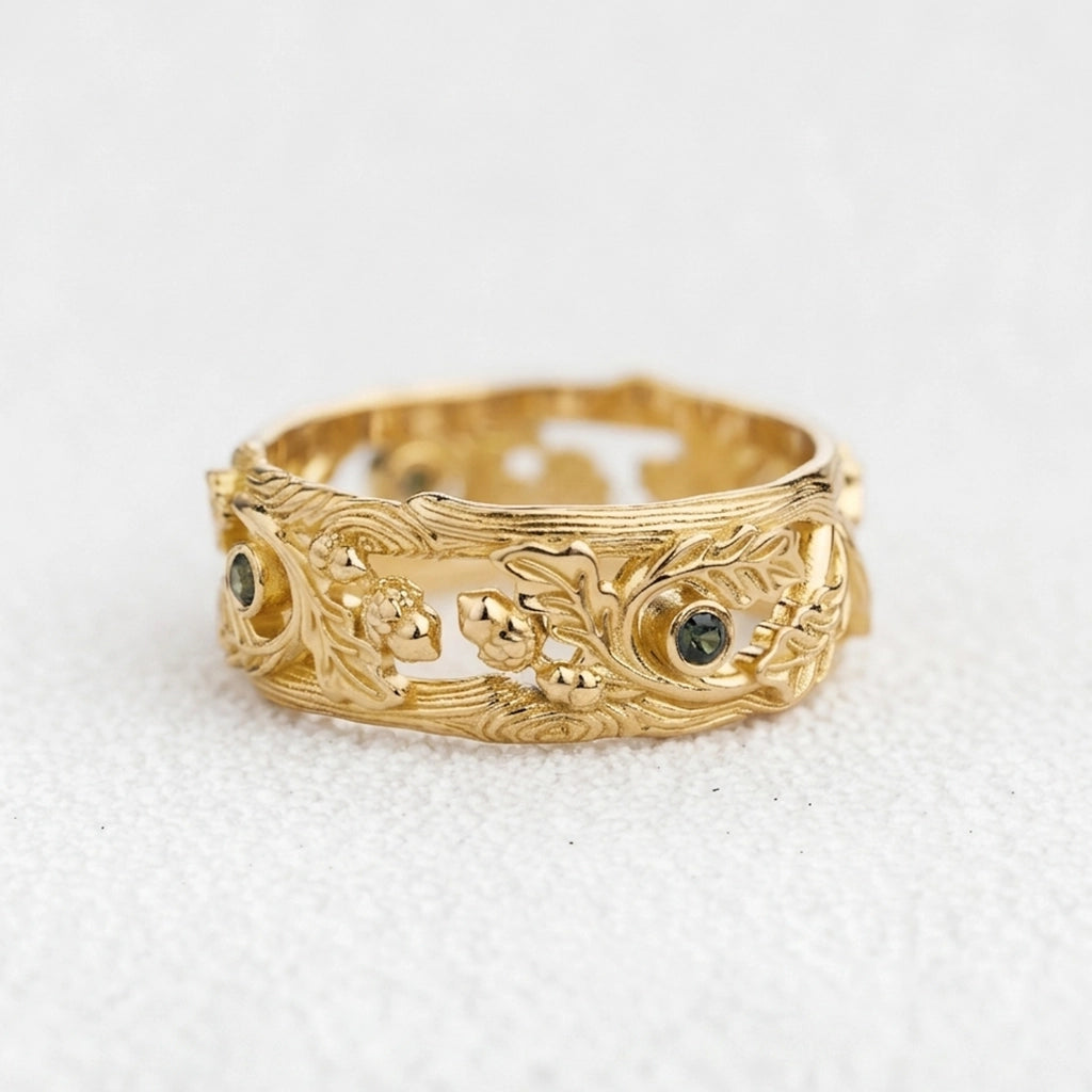 The Hollow Oak | Openwork Teal Sapphire Accented Acorn Men's Wedding Band.
