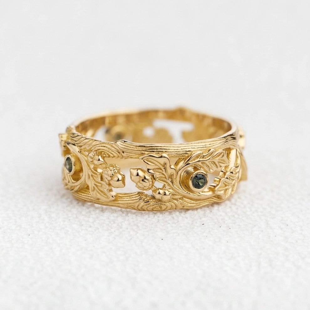 The Hollow Oak | Openwork Teal Sapphire Accented Acorn Men's Wedding Band.