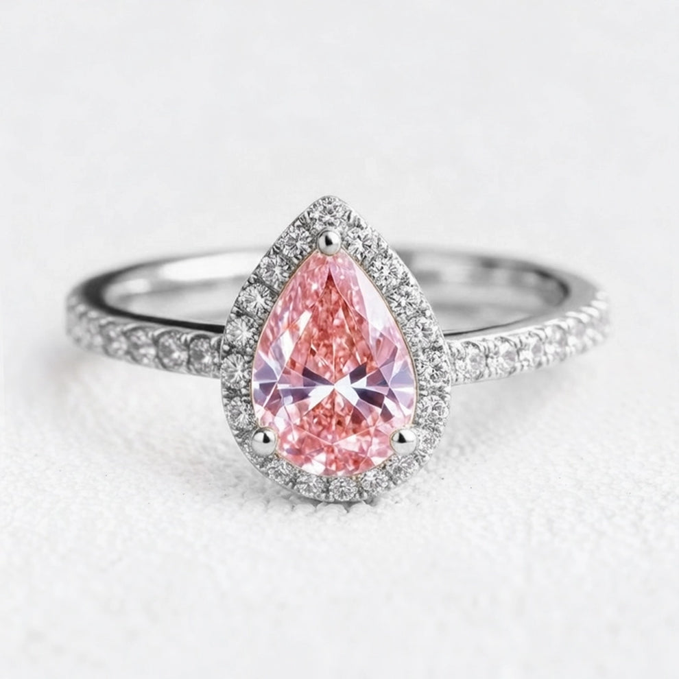 Stella’s Spark | 3CT Pear Cut Pink Sapphire Engagement Ring