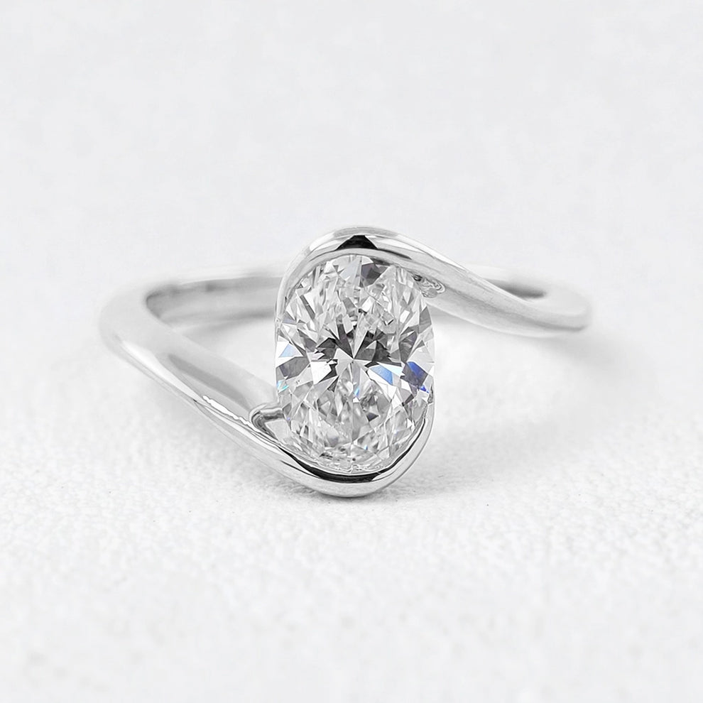 Alexandra’s Decadence | 4CT Oval Cut Vintage Diamond Ring