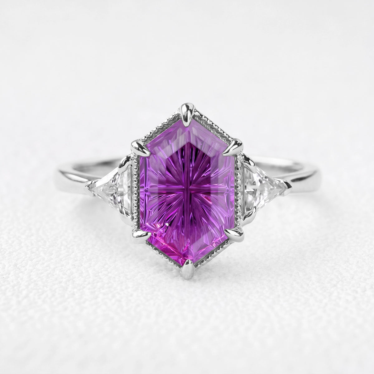 Theodora’s Twilight | Vintage Hexagon Fantasy-Cut Purple Sapphire Three-Stone Engagement Ring