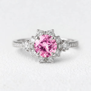Marina’s Embrace | Round Pink Sapphire Engagement Ring